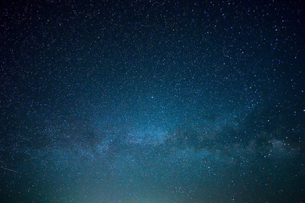 Logo image background of stars and sky at night